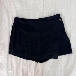 Black crinkle-texture high-waist skort with a wrap front panel